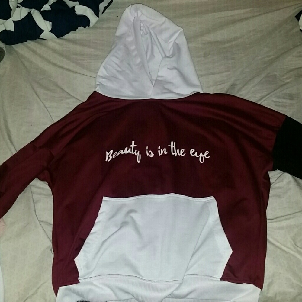 A hooded graphic sweater